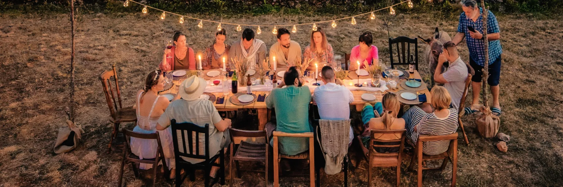 A table of people enjoying a meal